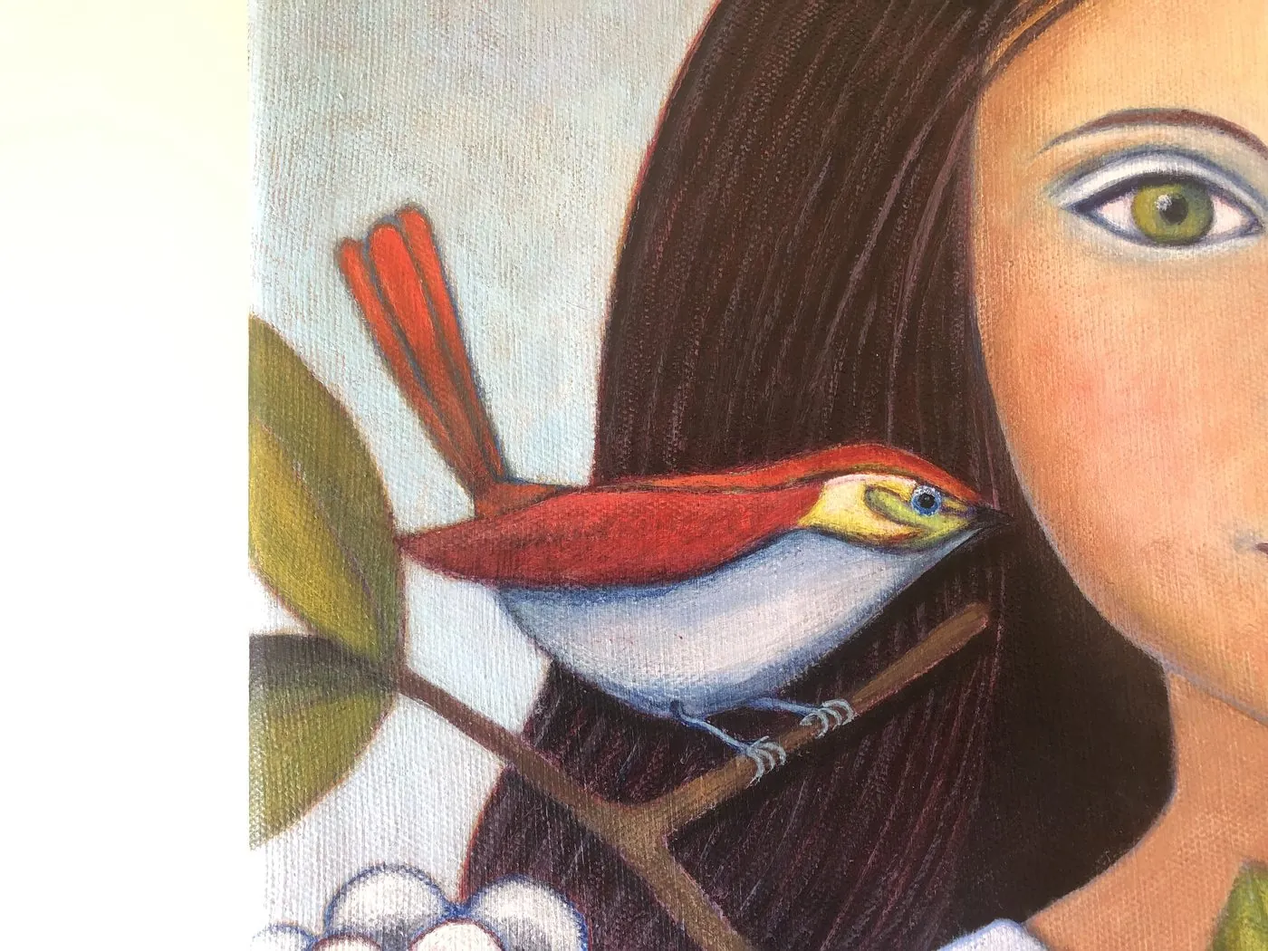 Painting of a cardinal on a branch.