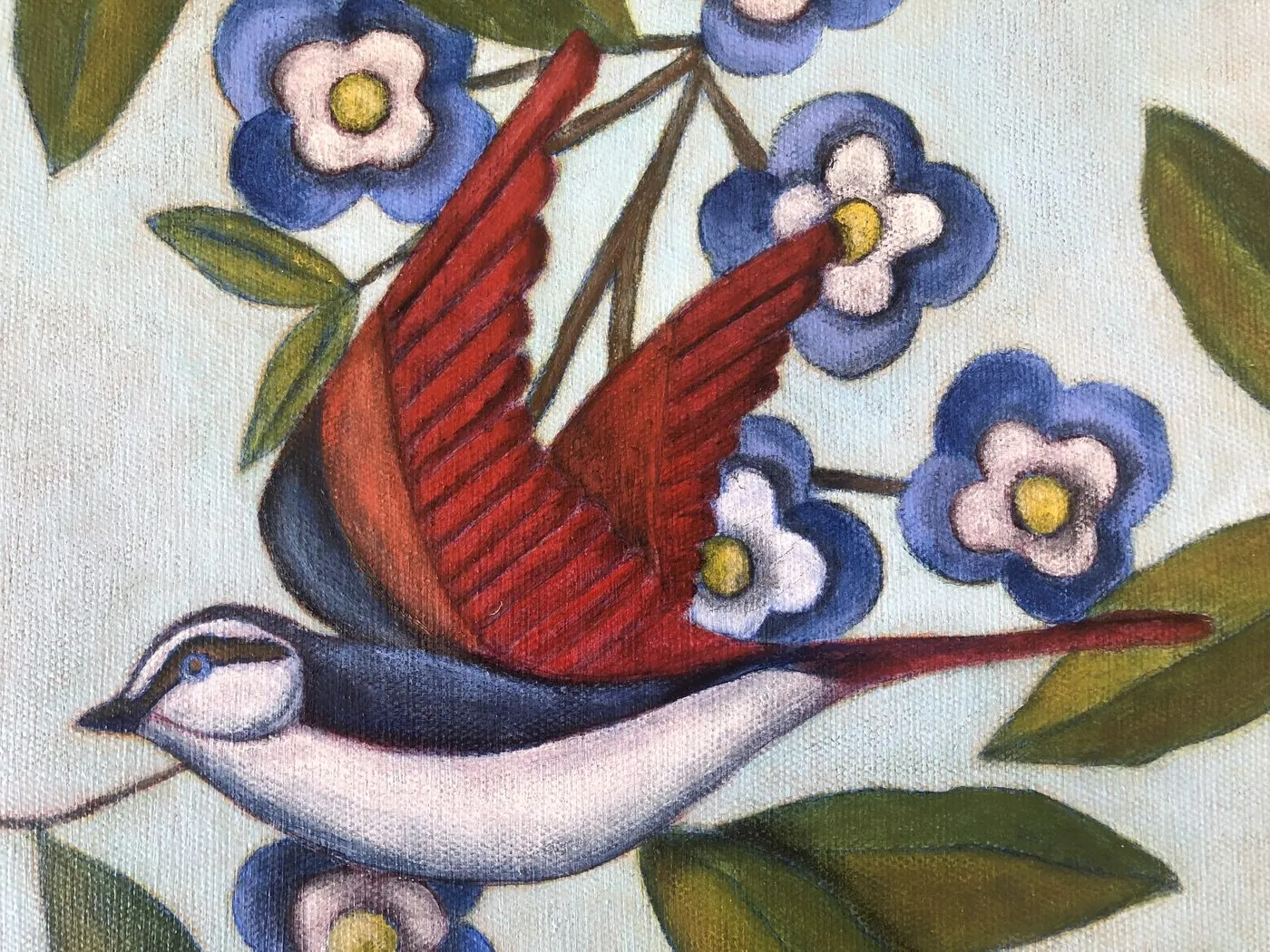 Painting of a red bird among blue flowers.